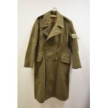 A 1939 pattern olive Greatcoat, by G Glanfield & Son Ltd, dated 1940, size No.5, with sergeant patch