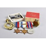 A WWII trio, comprising the War medal, the 1939-45 Star and the Atlantic Star with France and