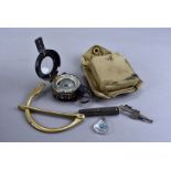 A WWII T.G.Co Ltd Mk III compass, dated 1941, No.B88216, in carry case, together with a Trident