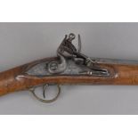 A 19th century Sharpe & Keene flintlock rifle, with makers name to lock plate, the long single