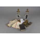 A pair of sword handle and hand guard candlestick holders, together with a WWI handkerchief,