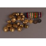 A collection of Welsh Guards buttons, comprising eight large and ten smaller, together with a WWII