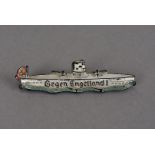 A Third Reich submarine pin badge, the badge in the form of a German U-Boat, with the inscription '