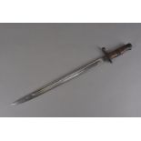 A British 1913 pattern sword bayonet by Remington, marked with broad arrow above crown and 7A,