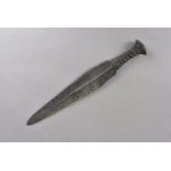 A Bronze Age Rapier, possibly Middle Eastern, the dagger forged from a single piece of bronze,