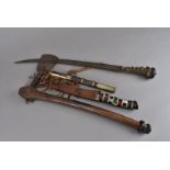 An interesting antler handled short sword, together with a an African tribal axe, a Japanese