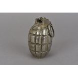 A British pineapple hand grenade, marked W to the side, Motor Equipment Birmingham marked to the