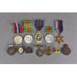 A WWII Royal Naval Reserves Decoration, engraved 1948 to reverse, together with four WWII medals,
