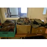 A large collection of various uniforms, including green smock combat 1968, smock combat camo, C/W