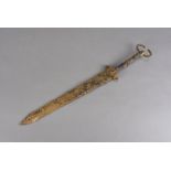 An Iron Age Antenna dagger, the iron blade and hilt forged out of a single piece of metal, with
