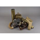 An assortment of militaria items, including a pair of small trench art shells, a large example, a