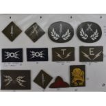 An assortment of cloth badges, including Armoured Infantry AFV Rarden Gunner, Army Air Compressed