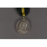 An Edward VII Territorial Force Efficiency medal, awarded to 84 PTE J.WHITE 10/ MANCH.REGT, on