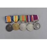 A WWI & WWII medal group, the WWI Victory and War medal awarded to G-24359 PTE C.T.KEWELL R.SUSS.