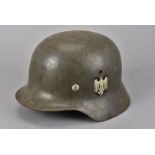 A German Army Double Decal M35 helmet, the green painted helmet with Heer decal to one side and