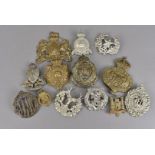 A group of 13 badges, to include Edward VII South Africa Constabulary, War Munitions Volunteer,