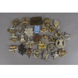 A selection of British cap badge, to include the Cameron Highlanders, 20th Hussars, Royal Fusiliers,