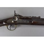 A late 19th Century percussion cap rifle by E M Reilly & Co of London, the three band rifle with