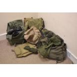 A large collection of 20th century equipment, including rucksacks, satchels etc, containing boots,
