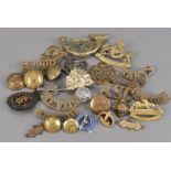 A large collection of buttons and badges, comprising Royal Army Medical Corps, Merchant Navy
