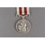 An Indian Mutiny medal, awarded to ACTG CORPORAL W M JAMESON 1ST C 2D BN BENGAL ARLY
