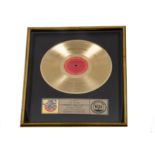 Judas Priest, An original RIAA Gold disc award present to Dave Holland the bands drummer from