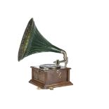 Horn gramophone, with green horn: in oak case with applied carving to front, Magnet-type soundbox