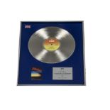 Judas Priest, An original BPI silver disc award present to Dave Holland the bands drummer from