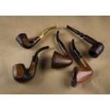 Five Israeli briar free hand carved estate pipes, comprising two Alpha's, with logo marked stems and