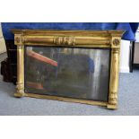 A 19th Century gilt over mantle mirror, having tapered column sides and top with stylised floral