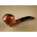A Bjarne sitter briar estate pipe, the apple shaped bowl with a straight grain, bent stem and curved