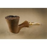 A Swinks briar free hand briar estate pipe, the straight grain sitter, with rusticated rim, marked