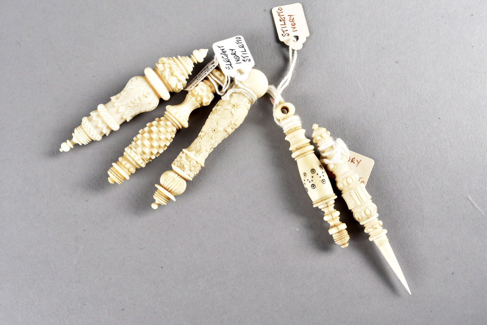Five 19th Century ornate carved ivory lace makers stilettos, all with reversible point carved with