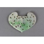 A 19th Century Chinese jade carved panel, of heart design, with pierced floral decoration, 4.2 cm