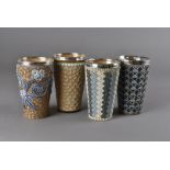 Four Doulton Lambeth beakers, one marked 1878, including makers Emily Dartington, Harriet Hibbert,