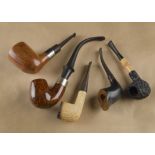 A small collection of briar estate pipes, comprising an American example by Chuck Sands, marked RC