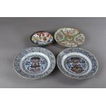 A pair of early 19th century Chinese imari export ware plates, decorated with floral designs,