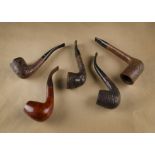 A collection of French briar pipes, including a Jobey Shellmoor no.145, curved shape, a Butx Choquin