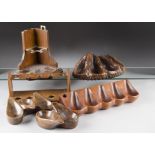 Two Dunhill hardwood three stand pipe racks, four Heatherwick of Auchterader five pipe examples, and