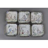 A set of six 19th Century Chinese enamel square dishes, each painted with scenes of figures within