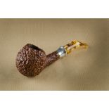 A Pierluigi briar estate pipe, the rusticated bowl, lightly smoked with a white metal collar,
