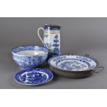 A collection of blue and white English pottery, including a hot plate, meat platter etc