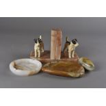 A pair of Art Deco pink onyx bookends, with enamelled spelter fox terriers 12.5 cm H, plus two