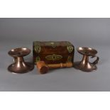 A pair of Arts & Crafts copper chambersticks, registered design number 27853, with removable sconces