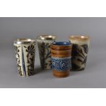 Three Doulton Lambeth beakers, one marked 1878, including makers Louise Edwards, Louisa Davis, and