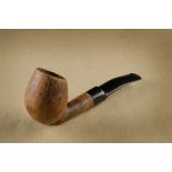 A Refbjerg briar estate pipe, the hand carved straight grain with oval bowl, and hand cut stem,