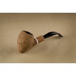 A Vacher briar estate pipe, the sandblasted bowl and tapered shank with white collar, and curved