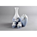 A pair of miniature Royal Copenhagen bud vases, with apple blossom design, 6.5 cm high together with