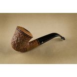 An Ascorti briar estate pipe, the rusticated bowl, bent shape, titled Business, with curved logo