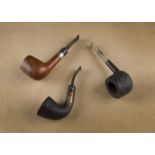 Three Stanwell Danish Briar estate pipes, Comprising a Stanwell 1986 year pipe, of bent horn shape